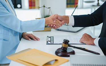 Handshake during a California family law consultation; preparing to meet with a divorce attorney.