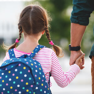  Father and daughter walking together, reflecting child custody in Oakland, CA - Law Office Of Sandra F. Banks